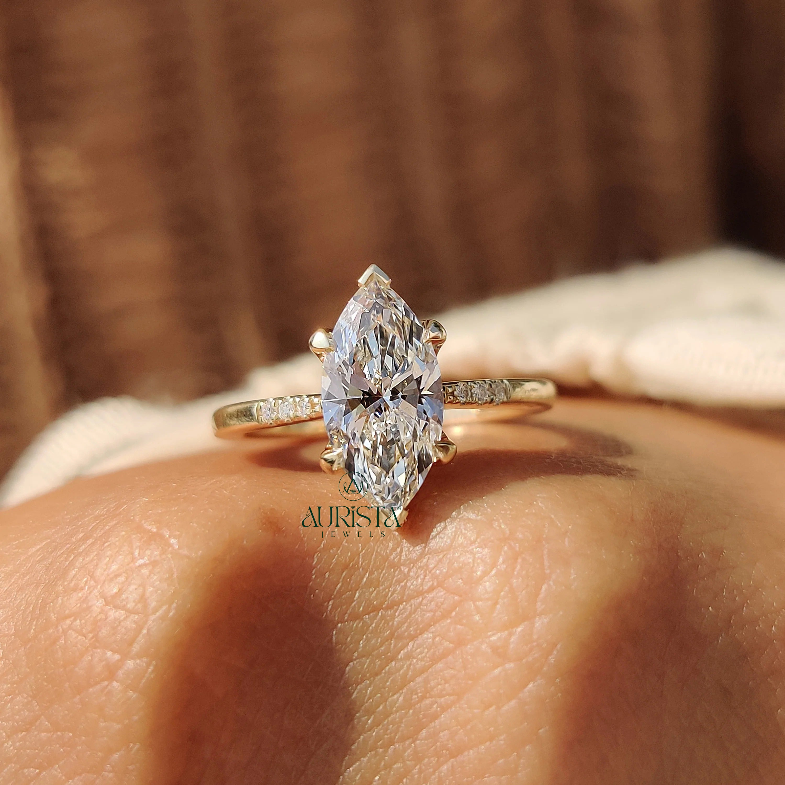 Marquise Cut Diamond Ring with Pave Side Stones
