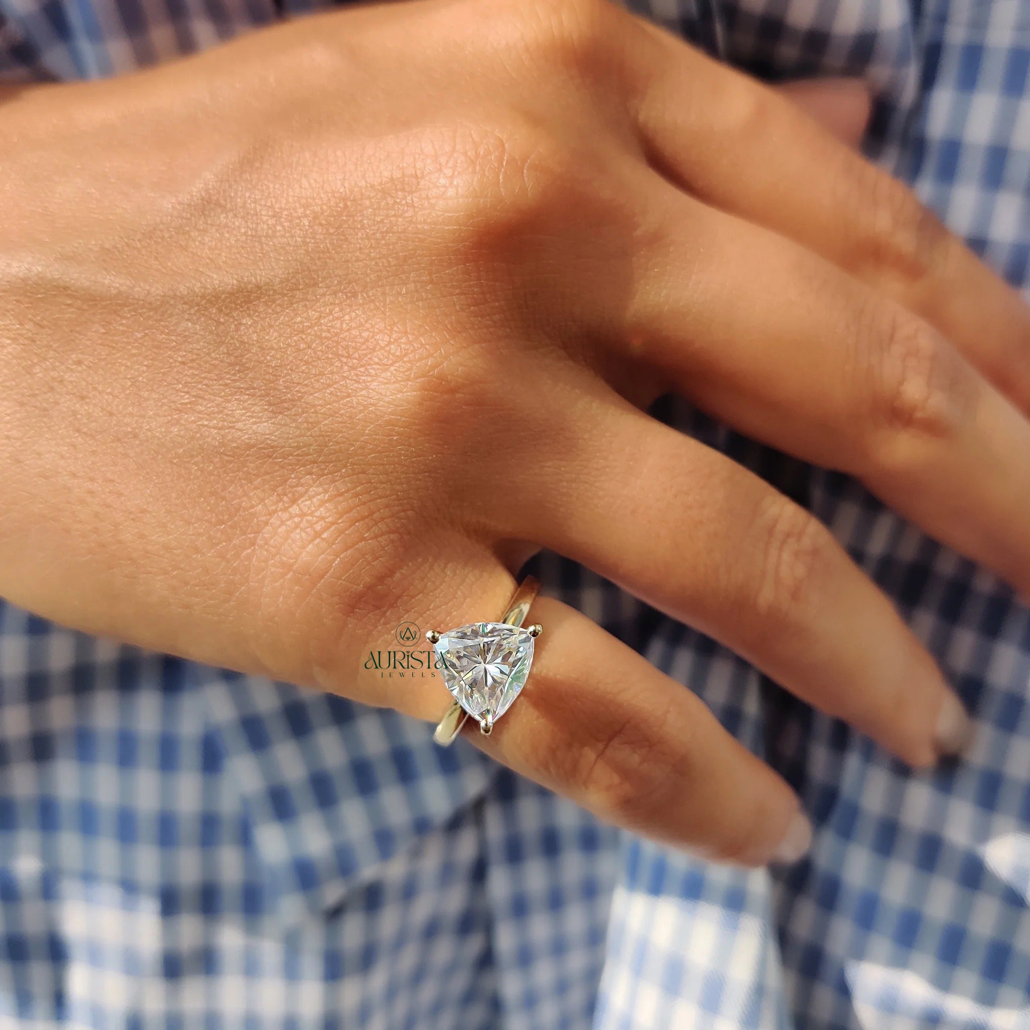 Trillion Cut Moissanite Solitaire Engagement Ring in Polished Yellow Gold Band