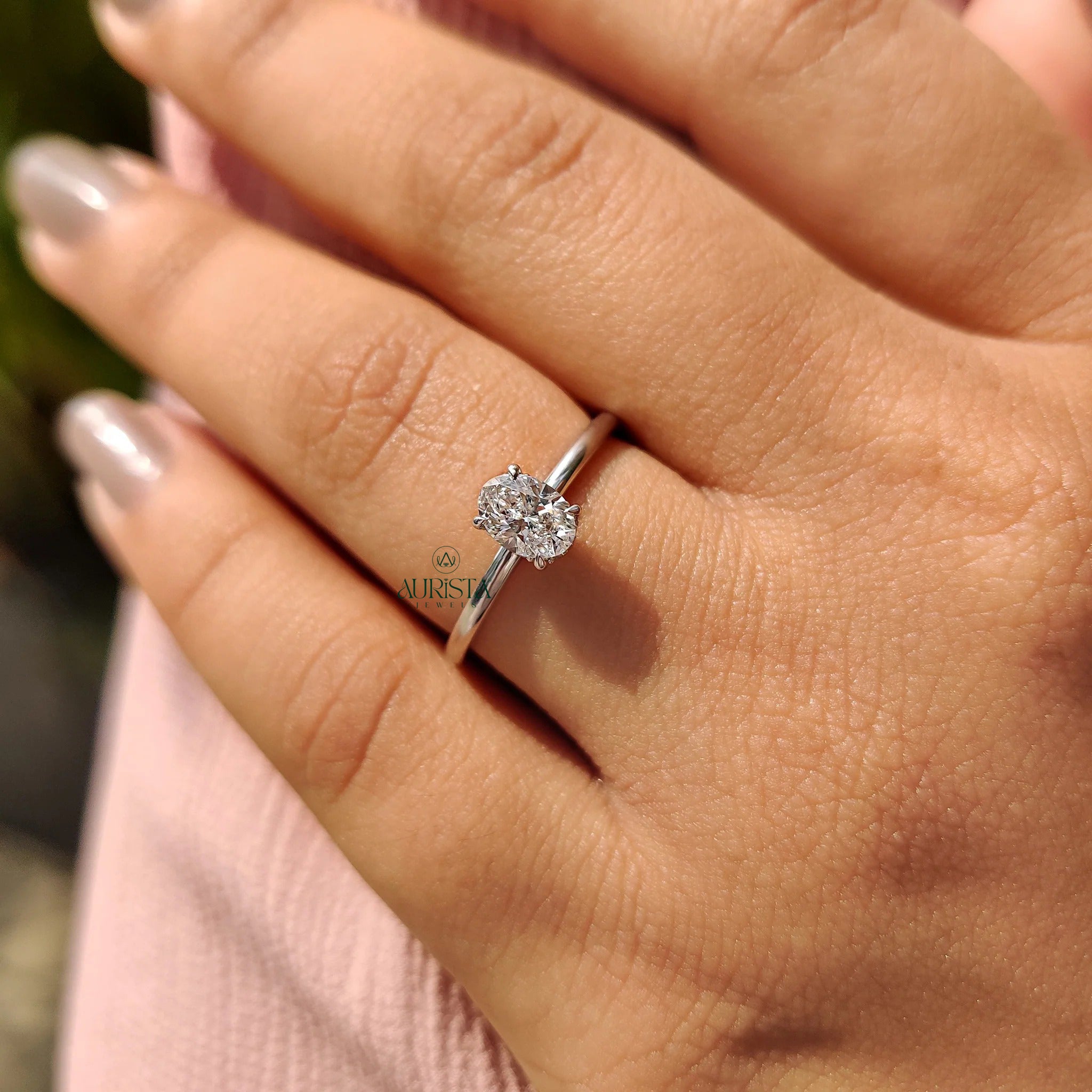 Oval Cut Diamond Four Prong Solitaire Ring with Hidden Halo