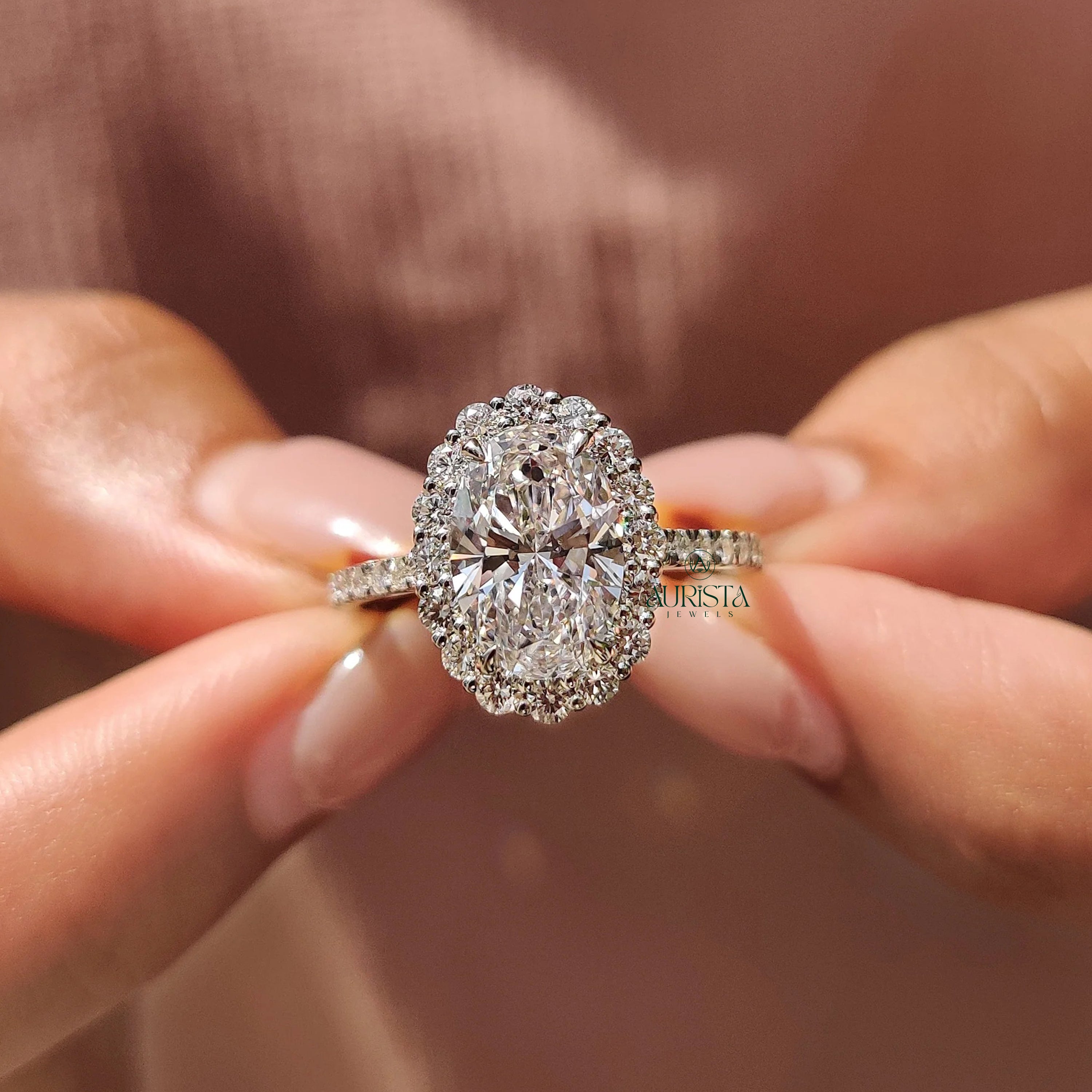 Oval Cut Diamond Halo Ring with Twisted Infinity Band