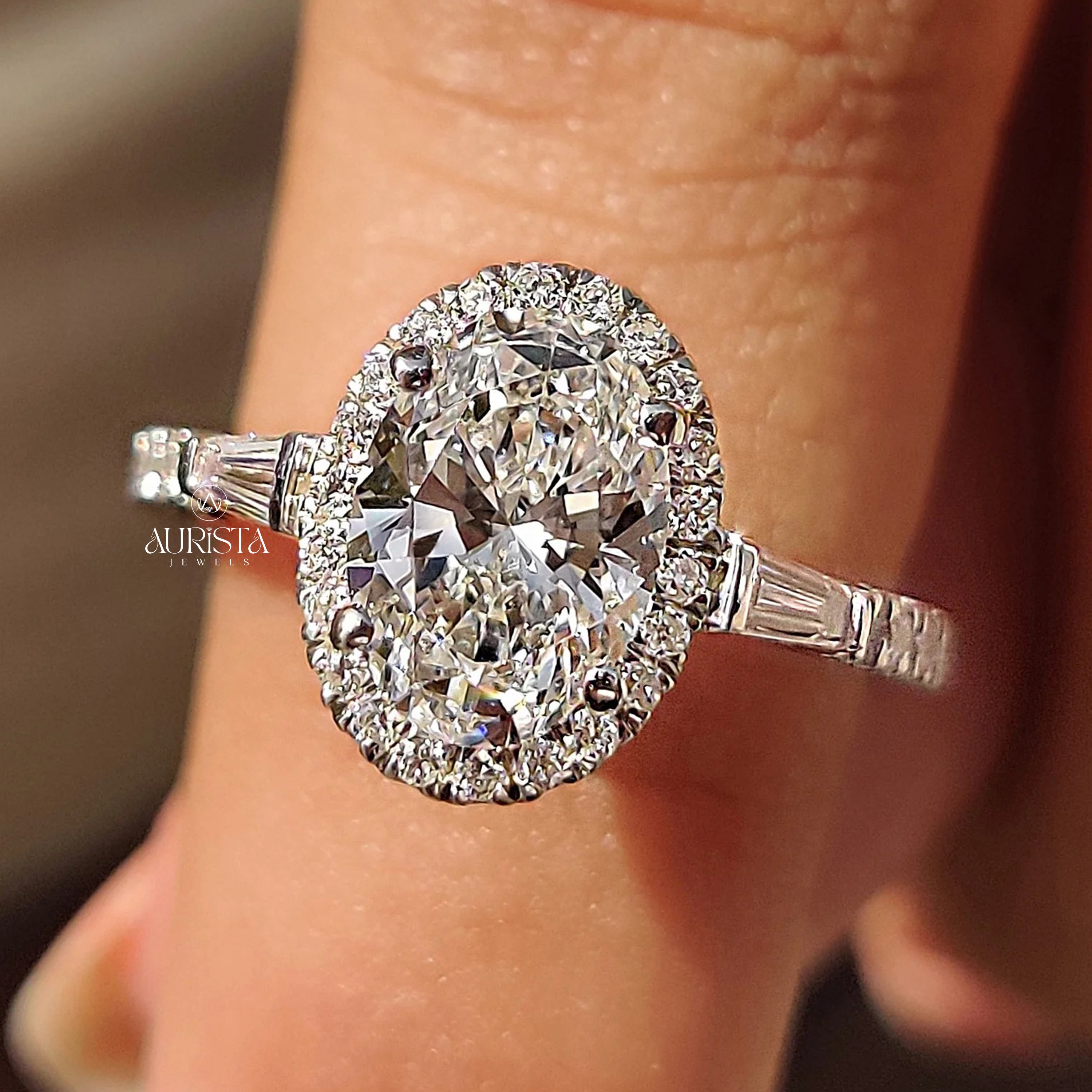 Oval Cut Diamond Ring with Baguette Side Stones