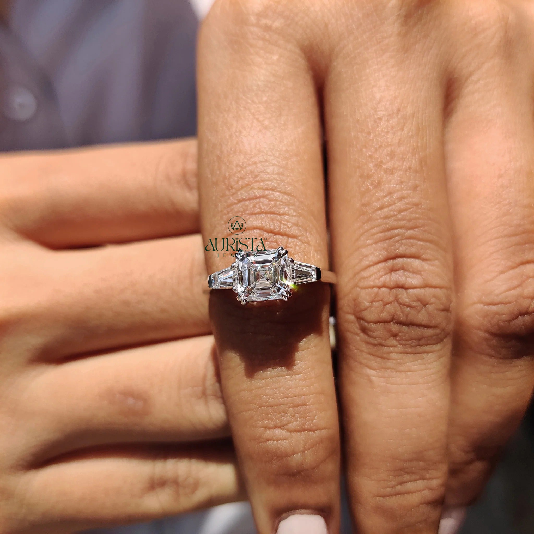 Asscher Cut Center with Tapered Baguette Side Stones