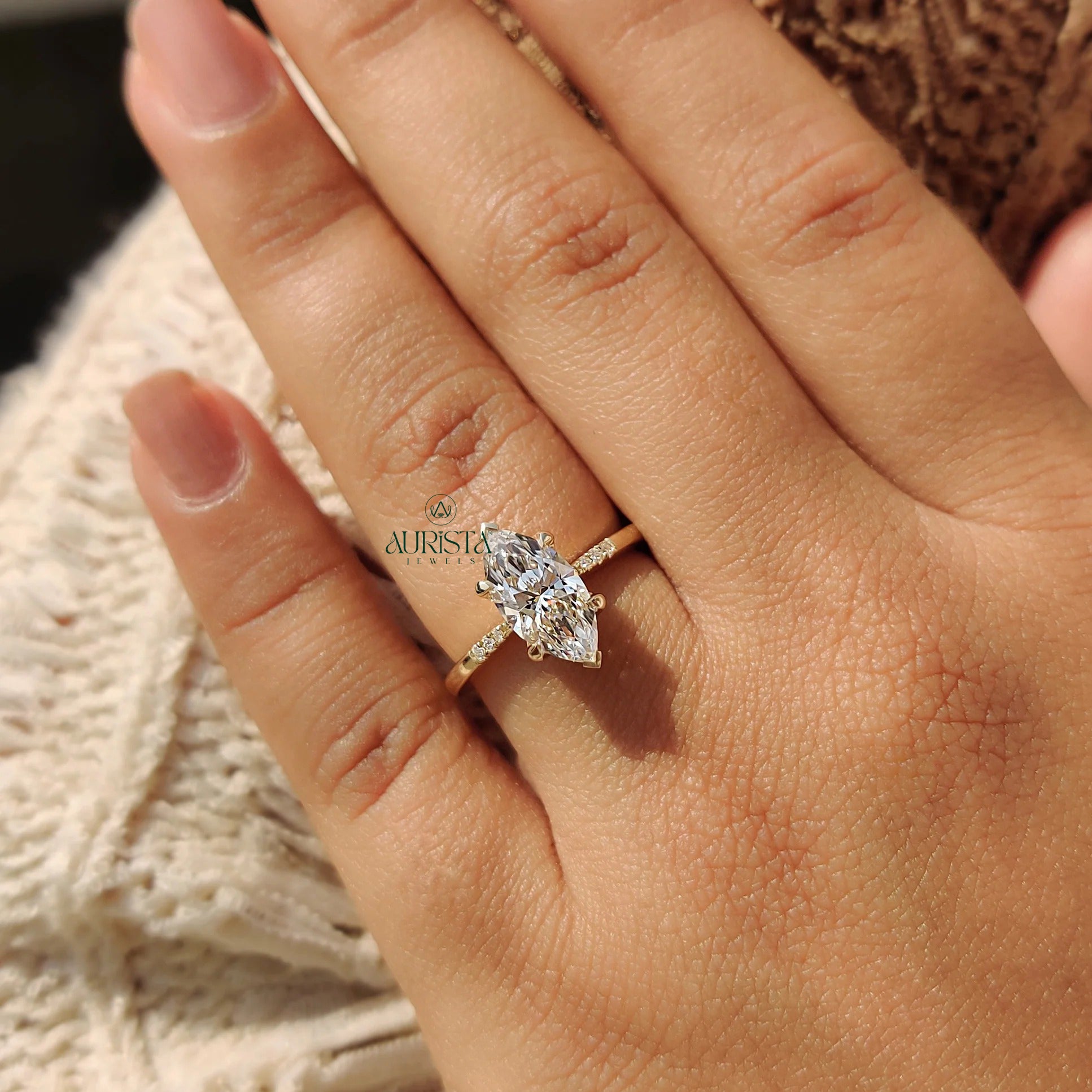 Marquise Cut Diamond Ring with Pave Side Stones