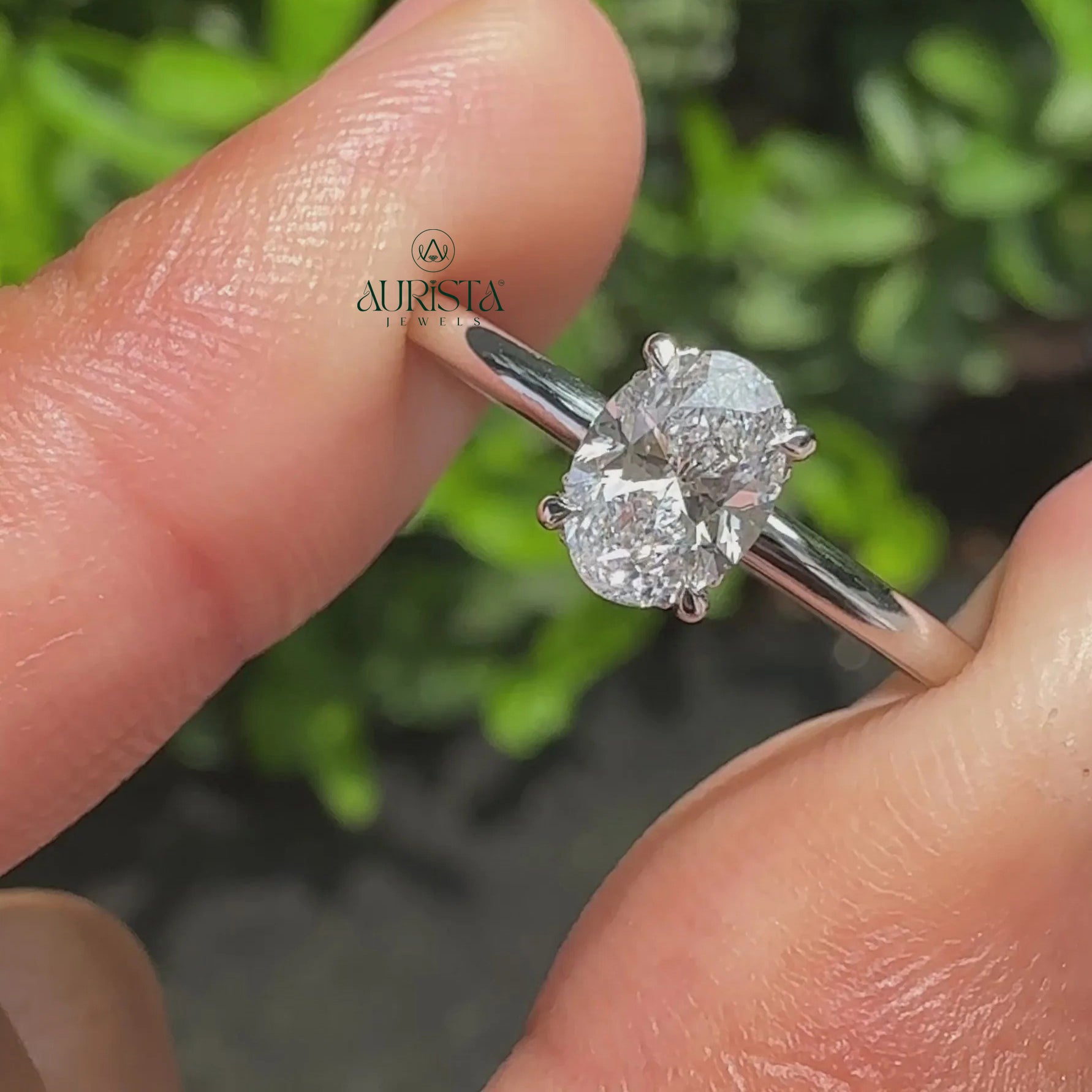 Oval Cut Diamond Four Prong Solitaire Ring with Hidden Halo