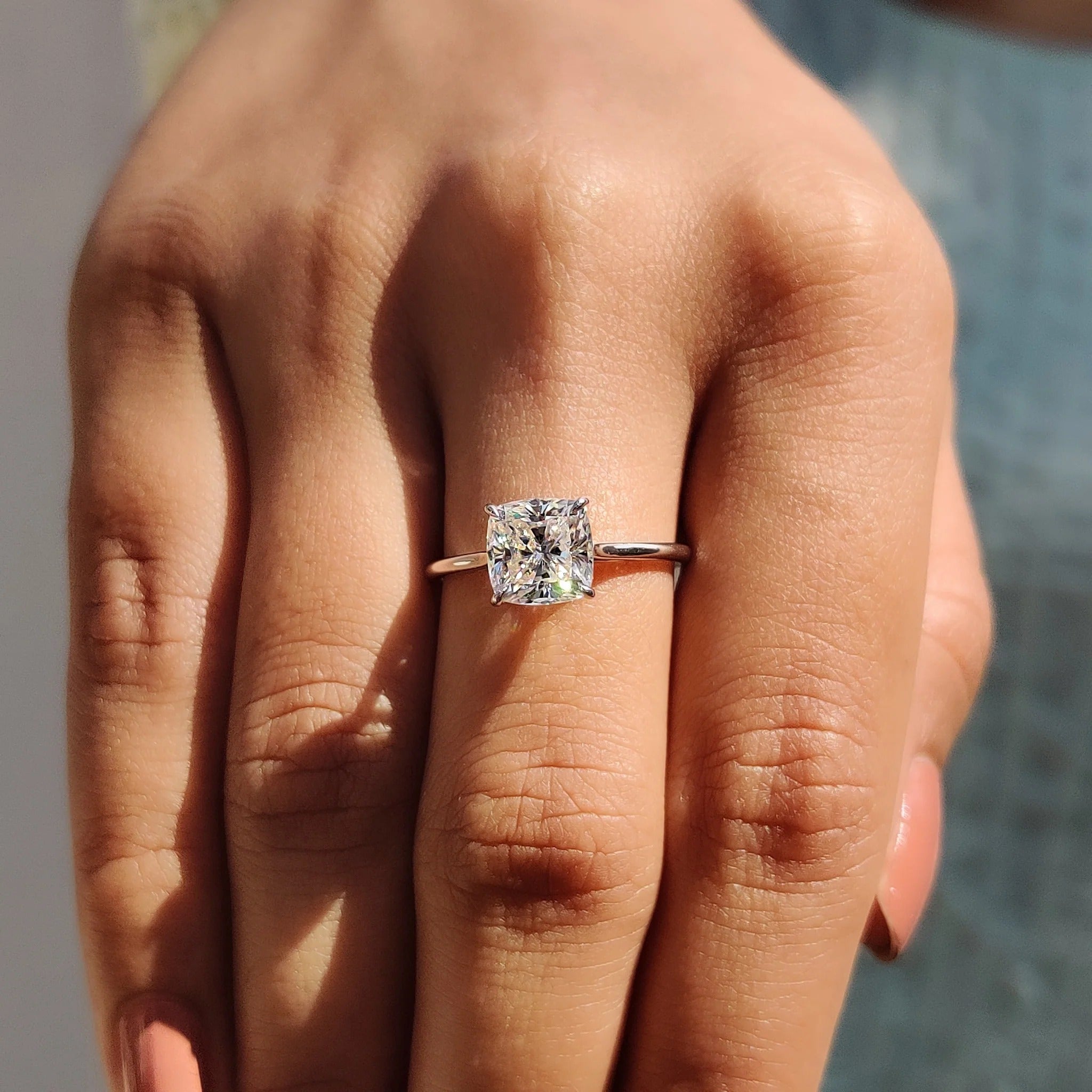 Cushion Cut Moissanite Solitaire Engagement Ring in Polished White Gold Minimalist Band