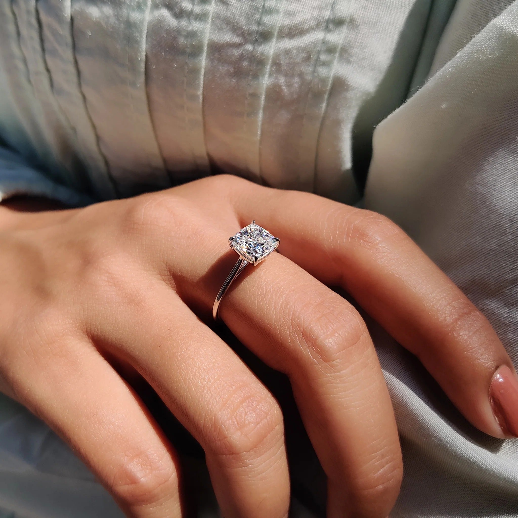 Cushion Cut Moissanite Solitaire Engagement Ring in Polished White Gold Minimalist Band
