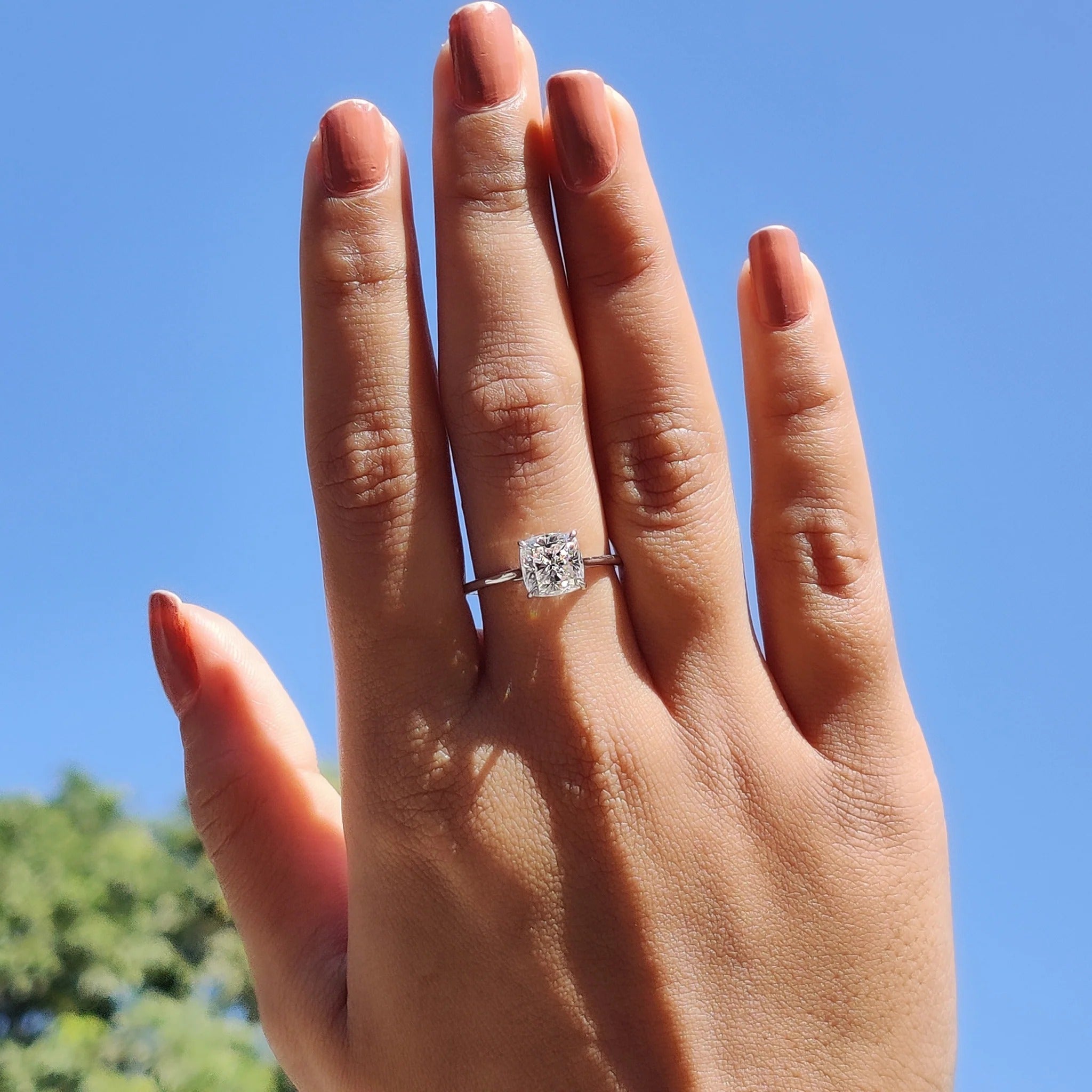 Cushion Cut Moissanite Solitaire Engagement Ring in Polished White Gold Minimalist Band