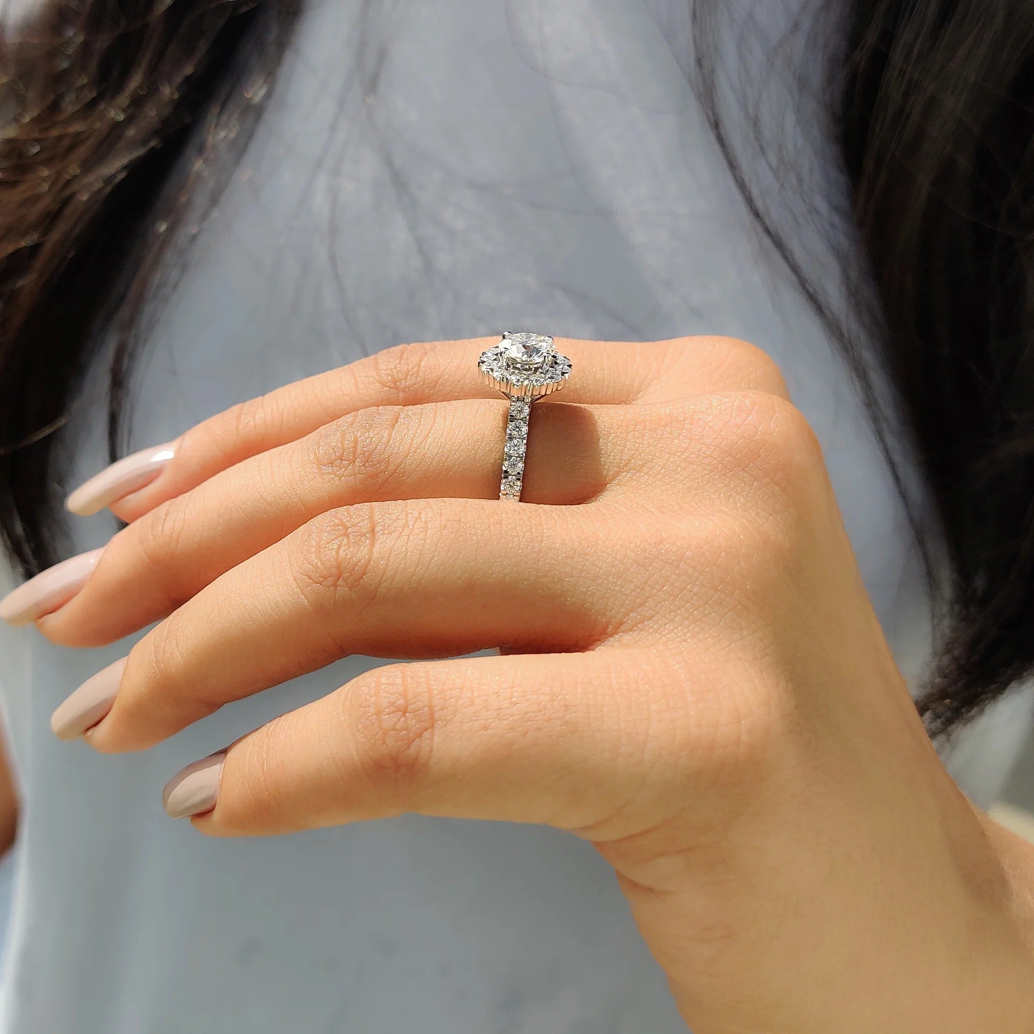 Round Cut Moissanite Halo Engagement Ring with Diamond Pave Band in White Gold